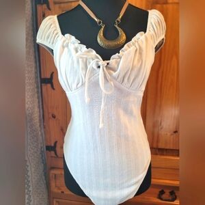 Elegant White Off-Shoulder Bodysuit